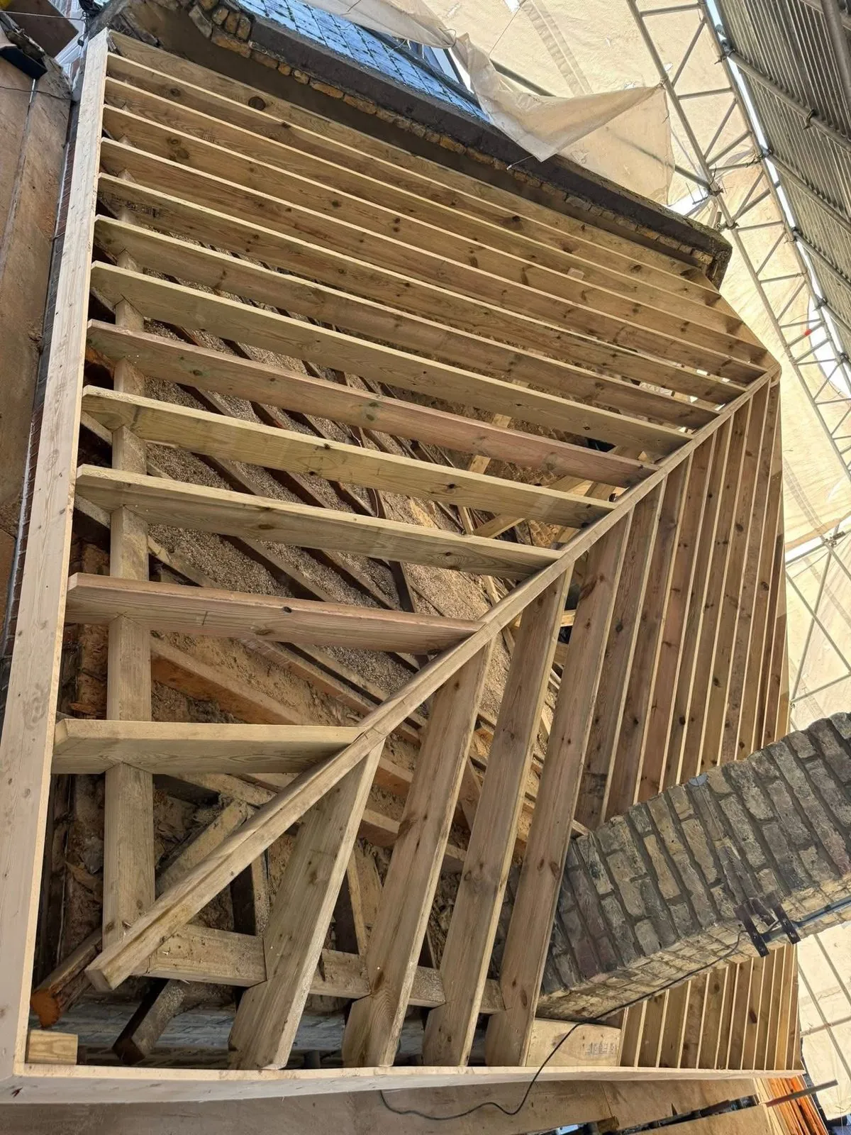 New roof timbers and rafters during a re-roof in Northam